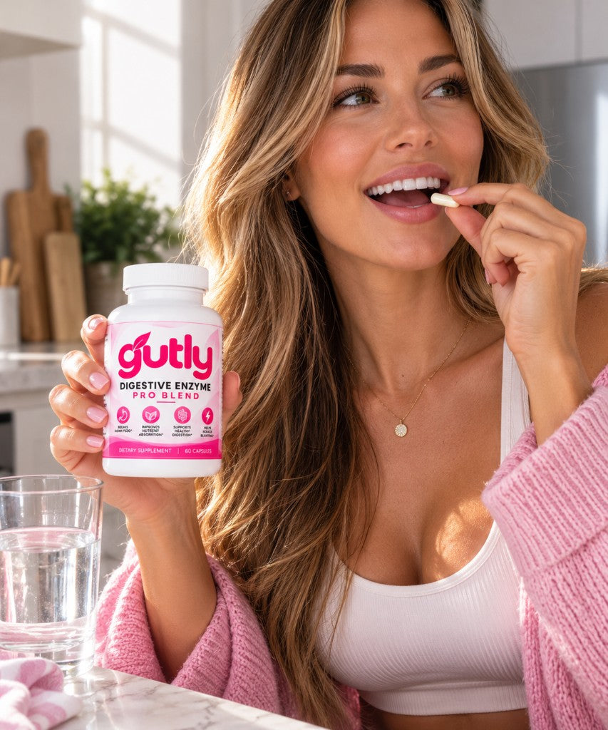 A woman holding Gutly Digestive Enzyme Pro Blend and taking a capsule